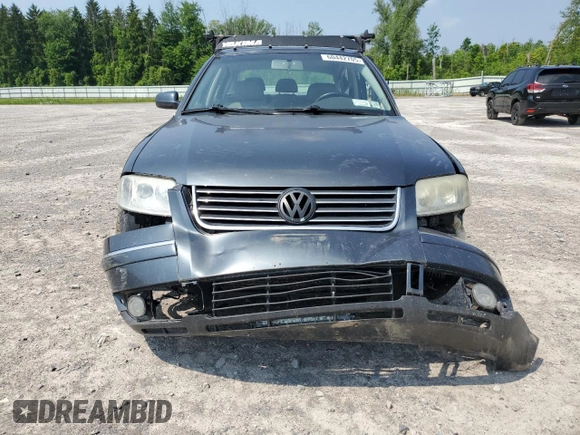 2004 Volkswagen Passat GLS with VIN WVWPD63B44P054997, listed as a Copart auction lot 60442705 with 238,851 mi miles and Salvage title. Bid and sale history available at DreamBid. Image 5.