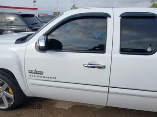 2013 Chevrolet Silverado 1500 LT with VIN 1GCRCSE05DZ366248, listed as a IAAI auction lot 42122068 with 233,316 mi miles and . Bid and sale history available at DreamBid. Image 14.