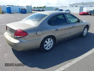 2005 Ford Taurus SEL z VIN 1FAFP56S35A312249, wystawiony jako IAAI lot #42293829 z przebiegiem 433 549 mil mil oraz . Historia ofert i sprzedaży dostępna na DreamBid. Obrazek 4.