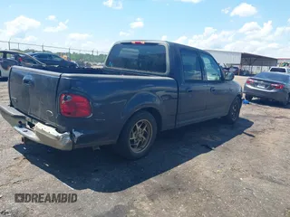 2001 Ford F-150 XLT с VIN 1FTRW07L41KA09067, выставлен на аукционе IAAI как лот 42459211 с пробегом 269 113 миль миль и . История ставок и продаж доступна на DreamBid. Изображение 4.