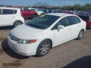 2007 Honda Civic Sdn LX with VIN 1HGFA16527L006070, listed as a IAAI auction lot 41953056 with 183,596 mi miles. Bid and sale history available at carsss.com. Image 2.