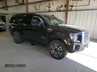 2021 GMC Yukon AT4 with VIN 1GKS2CKD7MR418968, listed as a Copart auction lot 82445284 with 73,660 mi miles and Salvage Title. Bid and sale history available at carsss.com. Image 4.