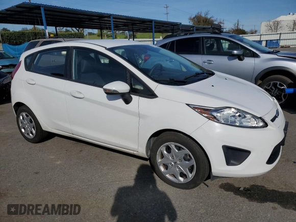 2013 Ford Fiesta SE with VIN 3FADP4EJ1DM141271, listed as a Copart auction lot 50059385 with 133,030 mi miles and Clean Title. Bid and sale history available at carsss.com. Image 4.
