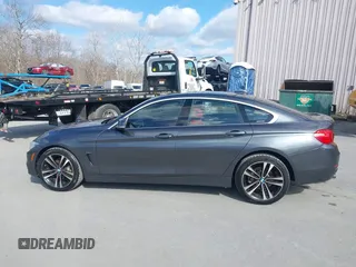 2016 BMW 4 Series 428i xDrive with VIN WBA4C9C56GG140427, listed as a IAAI auction lot 41886670 with 94,426 mi miles and . Bid and sale history available at carsss.com. Image 14.