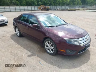 2012 Ford Fusion SE z VIN 3FAHP0HG2CR274536, wystawiony jako IAAI lot #42806039 z przebiegiem 122 934 mil mil oraz . Historia ofert i sprzedaży dostępna na DreamBid. Obrazek 1.