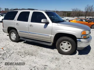 2005 GMC Yukon SLT z VIN 1GKEC13T95R103031, wystawiony jako Copart lot #48339205 z przebiegiem 268 183 mil mil oraz Szkoda całkowita • Salvage title. Historia ofert i sprzedaży dostępna na DreamBid. Obrazek 4.