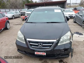 2006 Honda Odyssey EX-L with VIN 5FNRL38716B011262, listed as a IAAI auction lot 41707671 with 183,861 mi miles. Bid and sale history available at carsss.com. Image 12.