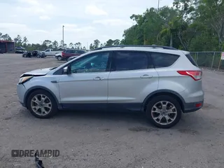 2013 Ford Escape SEL with VIN 1FMCU0H97DUD95194, listed as a IAAI auction lot 42052786 with 145,616 mi miles. Bid and sale history available at carsss.com. Image 14.