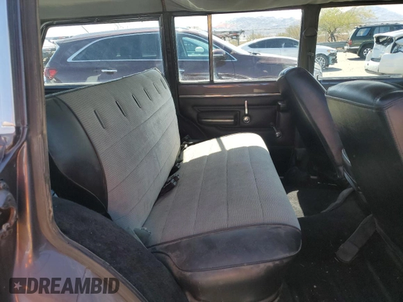 1976 Jeep Grand Wagoneer с VIN J6A15MZ101311, выставлен на аукционе Copart как лот 72651174 с пробегом 21 074 миль миль и Списание • Salvage title. История ставок и продаж доступна на DreamBid. Изображение 11.