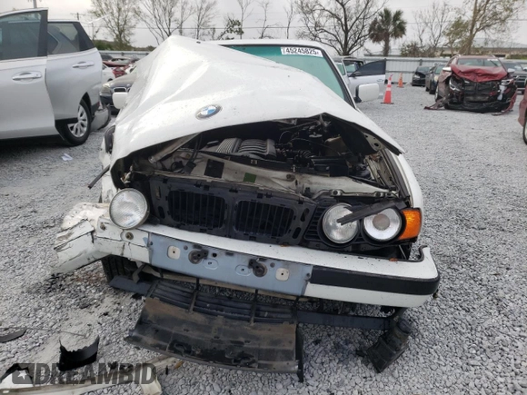 1995 BMW 5 Series 525i z VIN WBAHD6326SGK83552, wystawiony jako Copart lot #45245825 z przebiegiem 181 607 mil mil oraz Szkoda całkowita • Salvage title. Historia ofert i sprzedaży dostępna na DreamBid. Obrazek 5.
