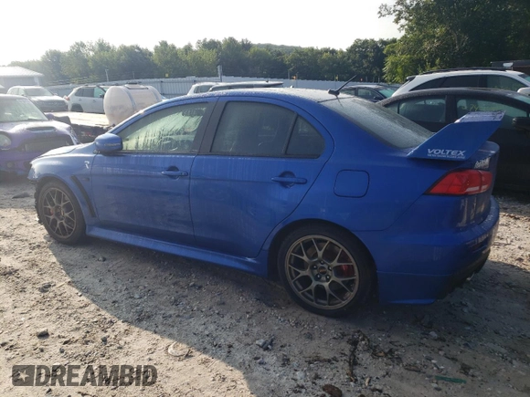 2015 Mitsubishi Lancer Evolution Final Edition z VIN JA32W7FV7FU608214, wystawiony jako Copart lot #68316174 z przebiegiem 56 714 mil mil oraz Szkody całkowita. Historia ofert i sprzedaży dostępna na DreamBid. Obrazek 2.