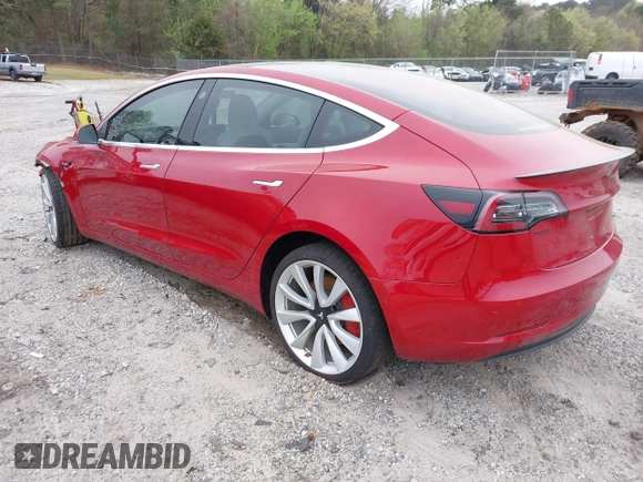 2018 Tesla Model 3 Long Range Battery with VIN 5YJ3E1EB7JF055384, listed as a IAAI auction lot 41924325 with 52,039 mi miles and . Bid and sale history available at DreamBid. Image 3.