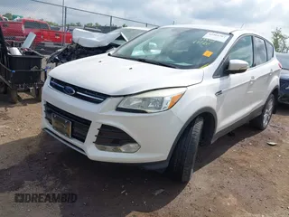 2013 Ford Escape SEL with VIN 1FMCU9HX6DUB14053, listed as a IAAI auction lot 42361297 with 144,861 mi miles and . Bid and sale history available at DreamBid. Image 17.