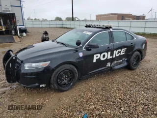 2014 Ford Police Interceptor with VIN 1FAHP2MT9EG111729, listed as a Copart auction lot 56947315 with 74,887 mi miles and Salvage title. Bid and sale history available at DreamBid. Image 1.