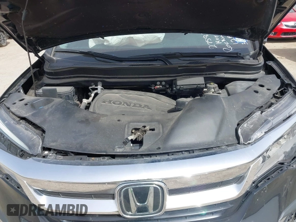 2020 Honda Pilot Touring 8-Passenger with VIN 5FNYF6H91LB003552, listed as a IAAI auction lot 41743685 with 76,725 mi miles and . Bid and sale history available at DreamBid. Image 10.