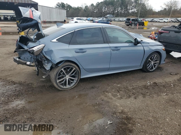 2023 Honda Civic Sedan Touring with VIN 2HGFE1F95PH313835, listed as a Copart auction lot 45145875 with 52,344 mi miles and Salvage Title. Bid and sale history available at carsss.com. Image 3.