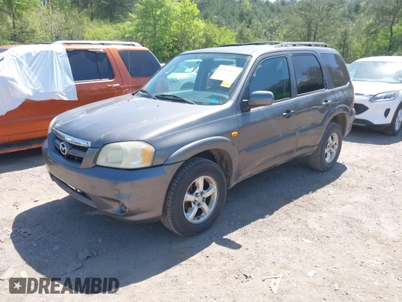2005 Mazda Tribute S with VIN 4F2YZ04125KM04568, listed as a IAAI auction lot 41973671 with 244,117 mi miles and . Bid and sale history available at carsss.com. Image 2.