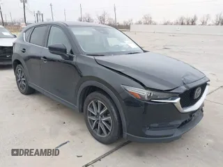 2017 Mazda CX-5 Grand Touring with VIN JM3KFADL9H0110985, listed as a IAAI auction lot 41435143 with 88,208 mi miles. Bid and sale history available at carsss.com. Image 1.