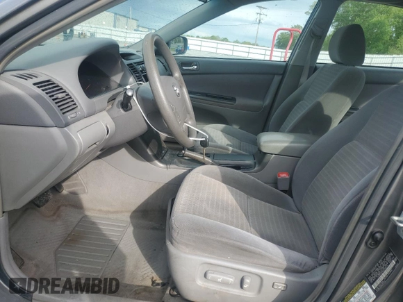 2005 Toyota Camry LE with VIN 4T1BF32K45U599214, listed as a Copart auction lot 52609295 with 304,316 mi miles and Salvage Title. Bid and sale history available at DreamBid. Image 7.