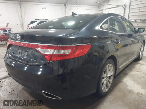 2013 Hyundai Azera z VIN KMHFG4JG4DA218608, wystawiony jako IAAI lot #41601792 z przebiegiem 101 846 mil mil oraz . Historia ofert i sprzedaży dostępna na DreamBid. Obrazek 4.