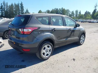 2018 Ford Escape S with VIN 1FMCU0F75JUD05716, listed as a IAAI auction lot 42733113 with 69,469 mi miles and . Bid and sale history available at DreamBid. Image 4.