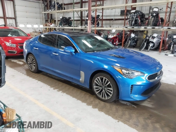 2018 Kia Stinger Premium with VIN KNAE25LA5J6017132, listed as a IAAI auction lot 42163195 with 176,947 mi miles. Bid and sale history available at carsss.com. Image 1.