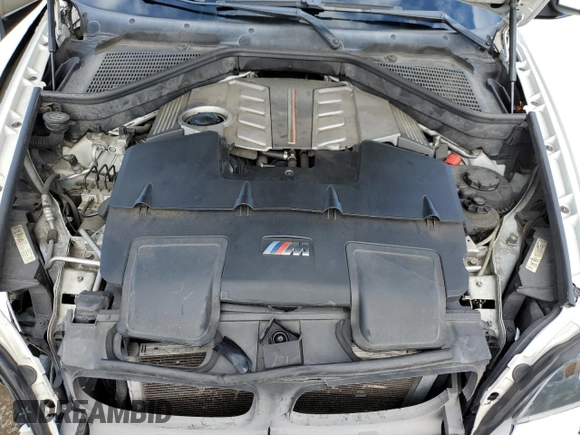 2010 BMW X5 M z VIN 5YMGY0C55ALK25116, wystawiony jako Copart lot #45366595 z przebiegiem 183 798 mil mil oraz Szkoda całkowita • Salvage title. Historia ofert i sprzedaży dostępna na DreamBid. Obrazek 13.