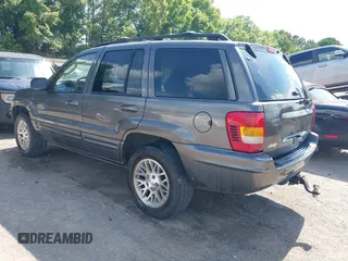 2002 Jeep Grand Cherokee Limited with VIN 1J4GW58J02C163931, listed as a IAAI auction lot 42632552 with 228,955 mi miles and . Bid and sale history available at DreamBid. Image 3.