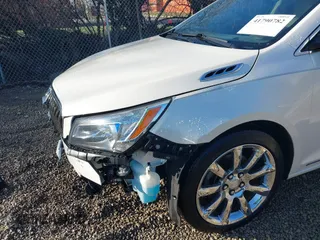 2014 Buick LaCrosse Premium I with VIN 1G4GD5G30EF205110, listed as a IAAI auction lot 41790782 with 154,132 mi miles and . Bid and sale history available at DreamBid. Image 18.