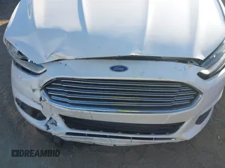 2013 Ford Fusion SE Hybrid with VIN 3FA6P0LU9DR375403, listed as a IAAI auction lot 40995125 with 132,583 mi miles. Bid and sale history available at carsss.com. Image 6.