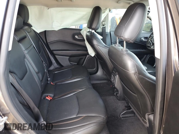 2018 Jeep Compass Limited z VIN 3C4NJCCBXJT361662, wystawiony jako Copart lot #57085315 z przebiegiem 61 815 mil mil oraz Szkoda całkowita • Salvage title. Historia ofert i sprzedaży dostępna na DreamBid. Obrazek 10.