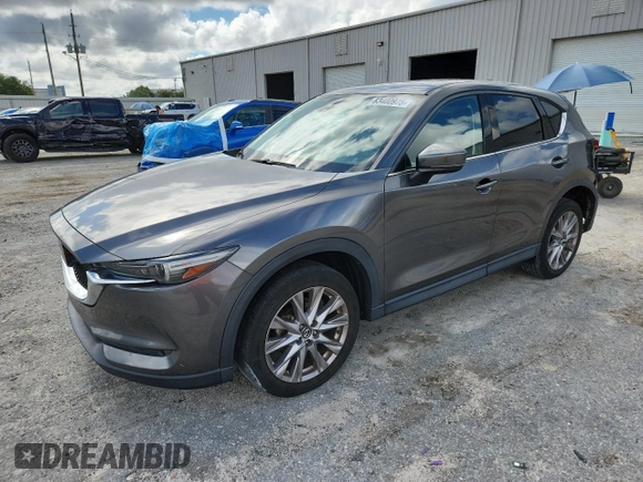 2019 Mazda CX-5 Grand Touring with VIN JM3KFADM2K1637664, listed as a Copart auction lot 63400975 with 45,663 mi miles and Salvage title. Bid and sale history available at DreamBid. Image 1.