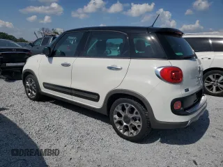 2014 FIAT 500L Trekking with VIN ZFBCFADH9EZ015734, listed as a Copart auction lot 57647185 with 67,302 mi miles and Salvage title. Bid and sale history available at DreamBid. Image 2.
