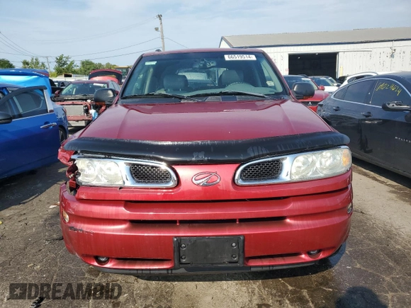 2002 Oldsmobile Bravada z VIN 1GHDT13S122365932, wystawiony jako Copart lot #66519514 z przebiegiem 112 322 mil mil oraz Szkody całkowita. Historia ofert i sprzedaży dostępna na DreamBid. Obrazek 5.