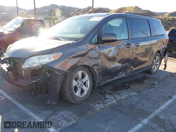 2015 Toyota Sienna LE AAS with VIN 5TDKK3DC3FS529845, listed as a IAAI auction lot 41627102 with 130,334 mi miles. Bid and sale history available at carsss.com. Image 6.