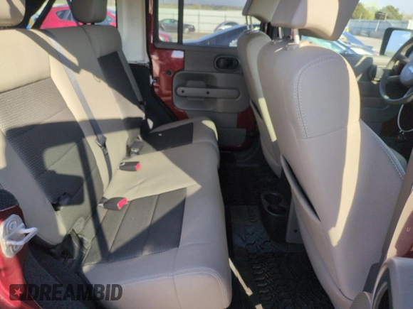 2010 Jeep Wrangler Unlimited Rubicon with VIN 1J4BA6H13AL140902, listed as a Copart auction lot 54335455 with 118,423 mi miles and Clean title. Bid and sale history available at DreamBid. Image 11.