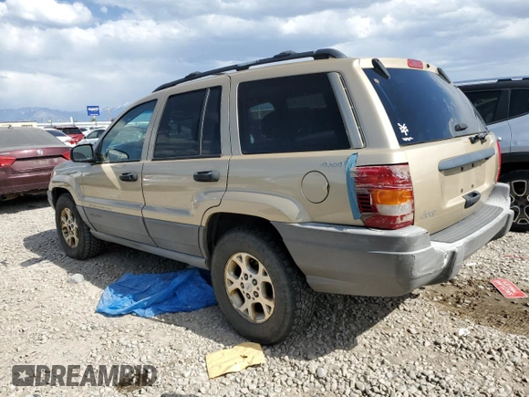 2000 Jeep Grand Cherokee Laredo with VIN 1J4GW48S6YC304447, listed as a Copart auction lot 58001035 with Not provided miles and Clean title. Bid and sale history available at DreamBid. Image 2.
