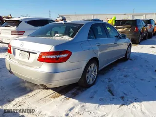 2013 Mercedes-Benz E-Class E 350 Luxury with VIN WDDHF8JB0DA768616, listed as a IAAI auction lot 41327288 with 142,125 mi miles. Bid and sale history available at carsss.com. Image 4.