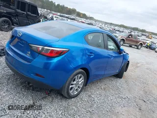 2016 Scion iA with VIN 3MYDLBZV2GY138644, listed as a IAAI auction lot 40790811 with 87,445 mi miles. Bid and sale history available at carsss.com. Image 4.