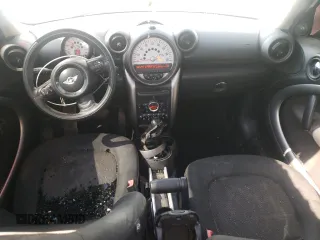 2011 MINI Countryman with VIN WMWZB3C53BWM01551, listed as a Copart auction lot 57284505 with 132,409 mi miles and Clean title. Bid and sale history available at DreamBid. Image 8.