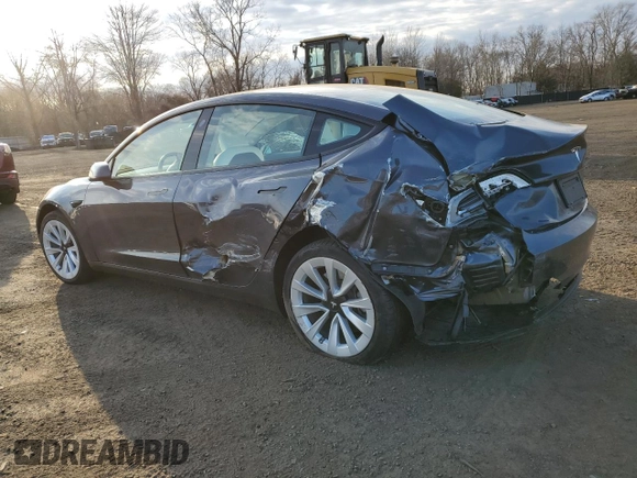 2023 Tesla Model 3 Long Range with VIN 5YJ3E1EBXPF660900, listed as a Copart auction lot 48923265 with 9,954 mi miles and Salvage Title. Bid and sale history available at DreamBid. Image 2.
