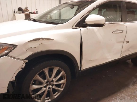 2014 Mazda CX-9 Grand Touring with VIN JM3TB3DA7E0428187, listed as a IAAI auction lot 41247569 with 117,590 mi miles and . Bid and sale history available at DreamBid. Image 6.