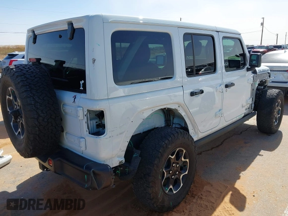 2023 Jeep Wrangler Rubicon with VIN 1C4JJXR63PW580370, listed as a IAAI auction lot 42017282 with 31,823 mi miles and . Bid and sale history available at DreamBid. Image 4.