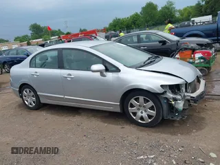 2009 Honda Civic LX z VIN 19XFA16529E038947, wystawiony jako IAAI lot #42412486 z przebiegiem 161 409 mil mil oraz . Historia ofert i sprzedaży dostępna na DreamBid. Obrazek 14.