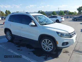 2014 Volkswagen Tiguan SE with VIN WVGAV3AX2EW565031, listed as a IAAI auction lot 42626157 with 202,087 mi miles and . Bid and sale history available at DreamBid. Image 1.