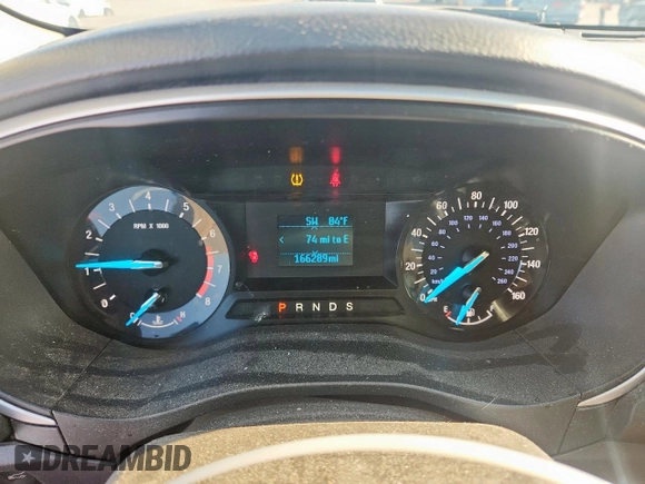 2016 Ford Fusion S with VIN 3FA6P0G79GR187151, listed as a Copart auction lot 61294735 with 166,289 mi miles and Salvage title. Bid and sale history available at DreamBid. Image 9.
