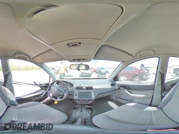 2007 Ford Focus S z VIN 1FAHP34N17W103625, wystawiony jako Copart lot #55300395 z przebiegiem 82 041 mil mil oraz Szkoda całkowita • Salvage title. Historia ofert i sprzedaży dostępna na DreamBid. Obrazek 14.