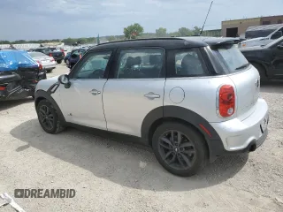 2014 MINI Countryman S with VIN WMWZC5C55EWM18087, listed as a Copart auction lot 68661614 with Not provided miles and Salvage title. Bid and sale history available at DreamBid. Image 2.