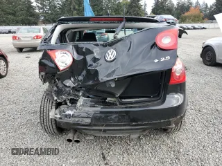 2009 Volkswagen Rabbit S with VIN WVWBB71K89W037593, listed as a Copart auction lot 74941614 with 51,645 mi miles and Salvage title. Bid and sale history available at DreamBid. Image 6.