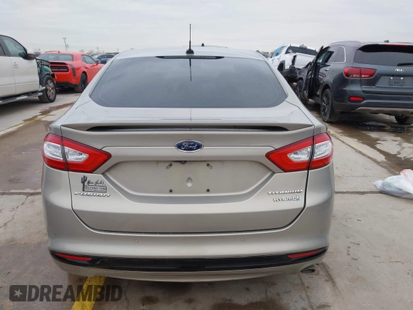 2016 Ford Fusion Titanium Hybrid with VIN 3FA6P0RU9GR143203, listed as a IAAI auction lot 41332144 with 94,357 mi miles. Bid and sale history available at carsss.com. Image 17.